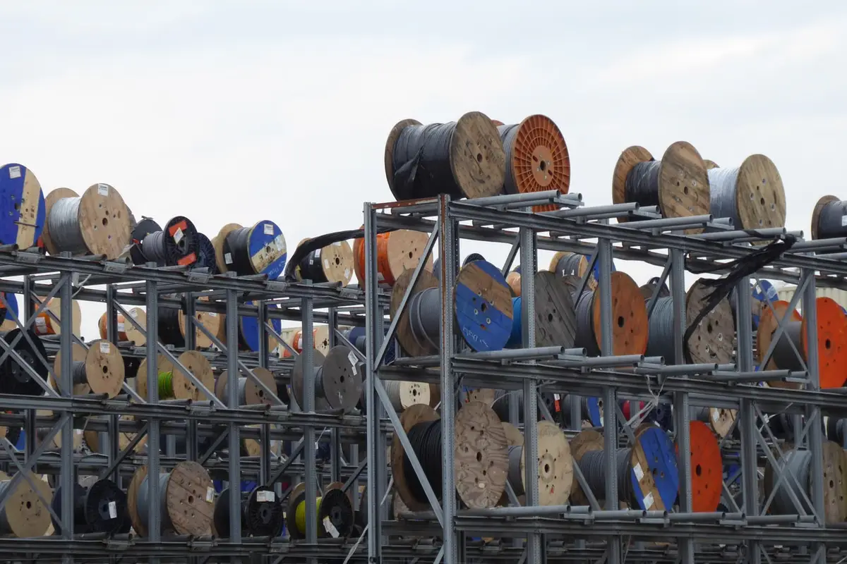 Cable and wire manufacturing conveyor systems